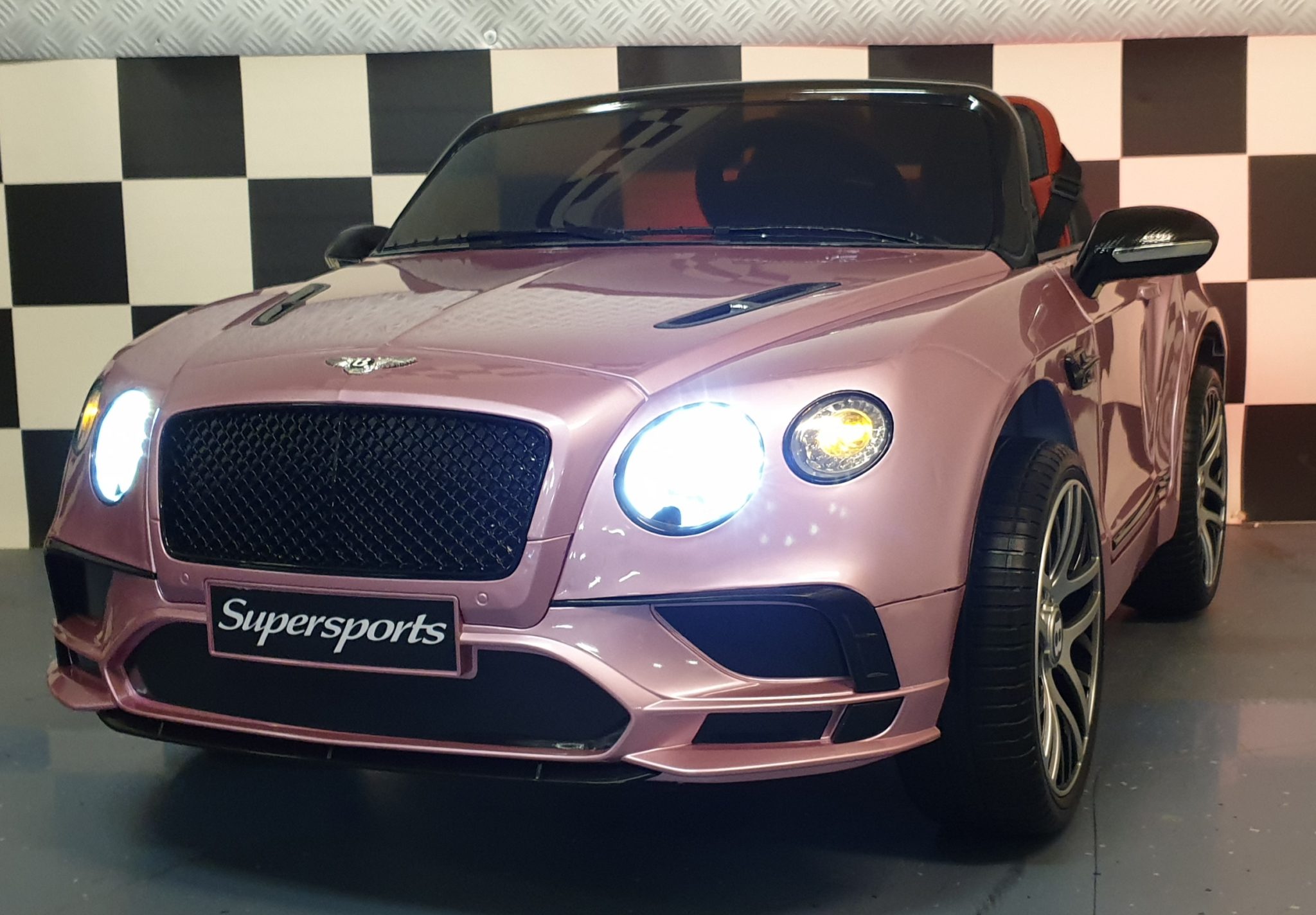 Children’s battery toy car Bentley Continental metallic pink