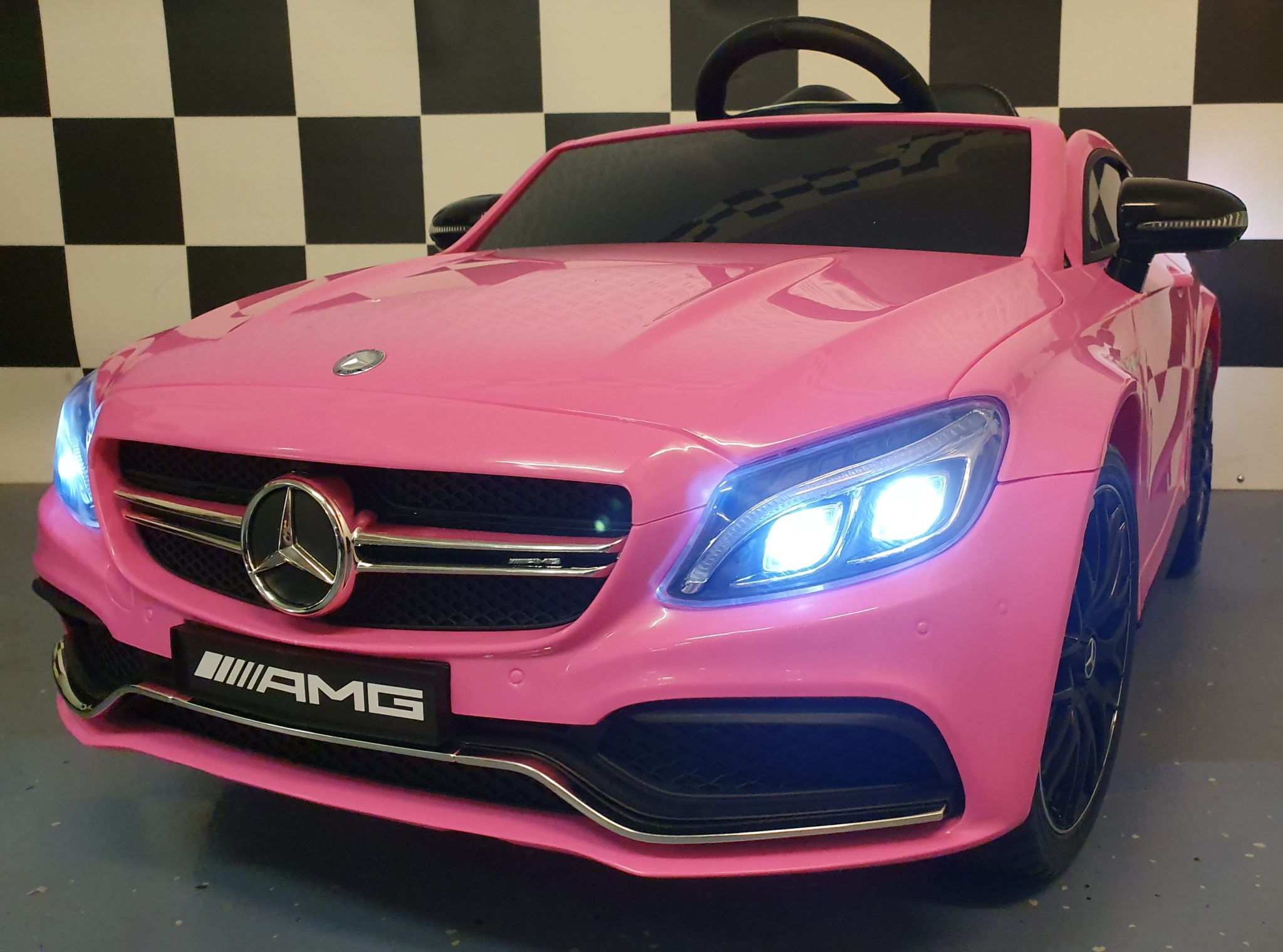 Children’s car Mercedes C63 12 volts with remote control pink