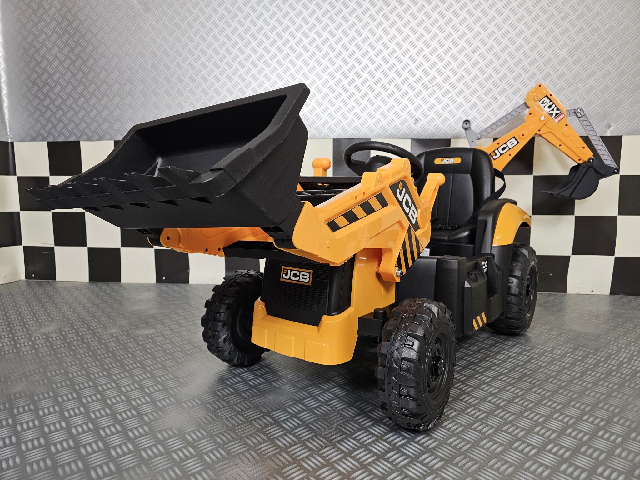 Children’s tractor JCB Sitemaster 12 volts