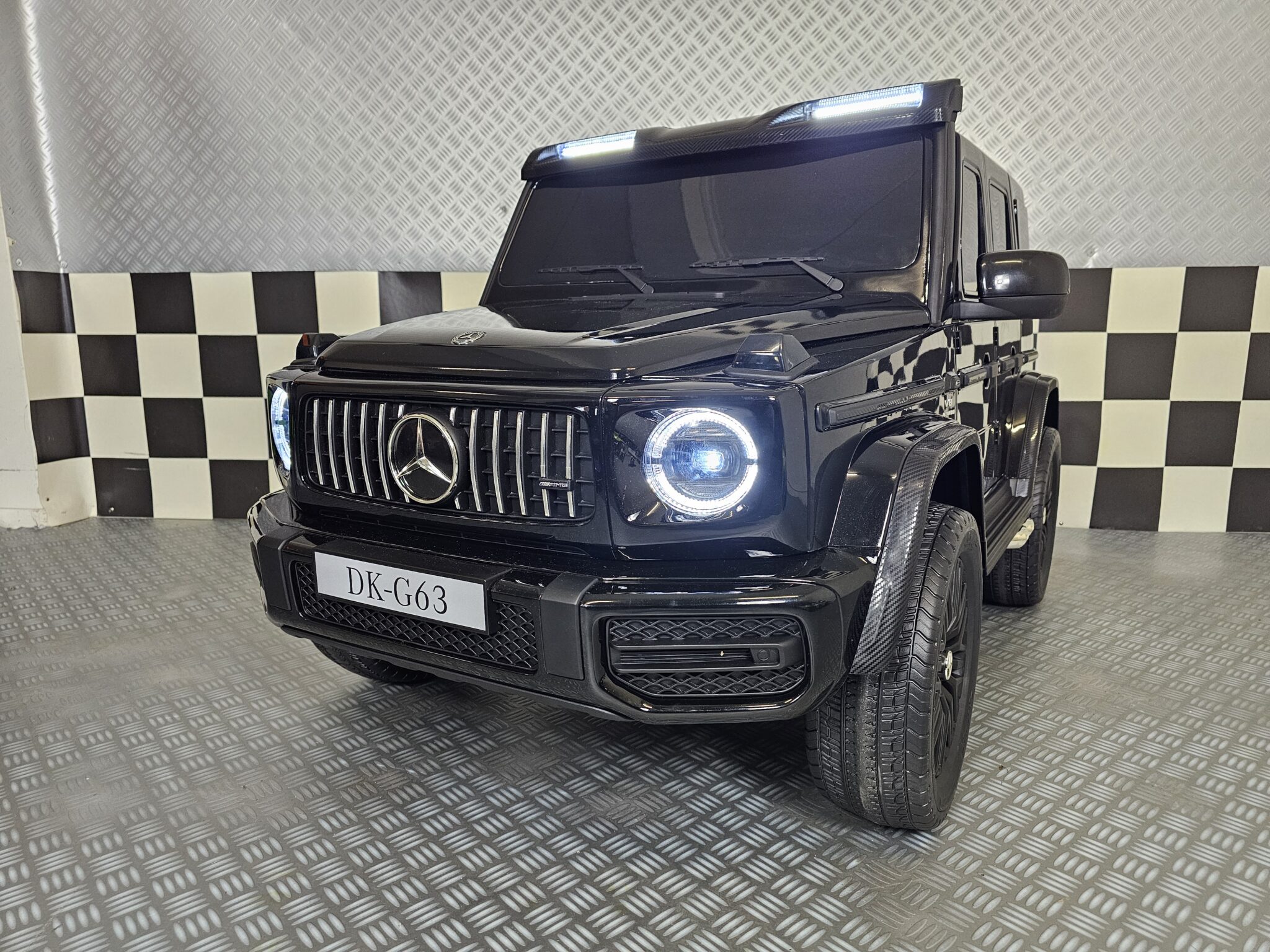 Children’s car Mercedes G63 AMG 4×4 24 volt 2 persons metallic black